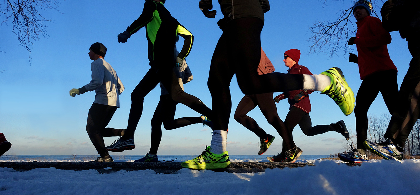 Runners by the lake