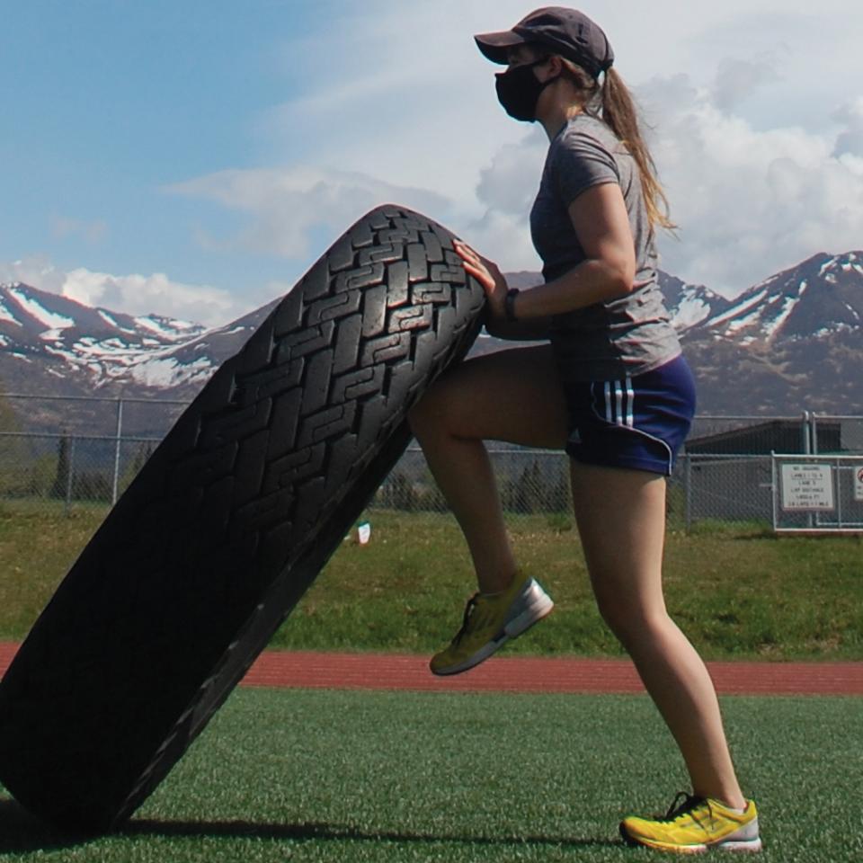 Vera Soloview doing tire training in Alaska