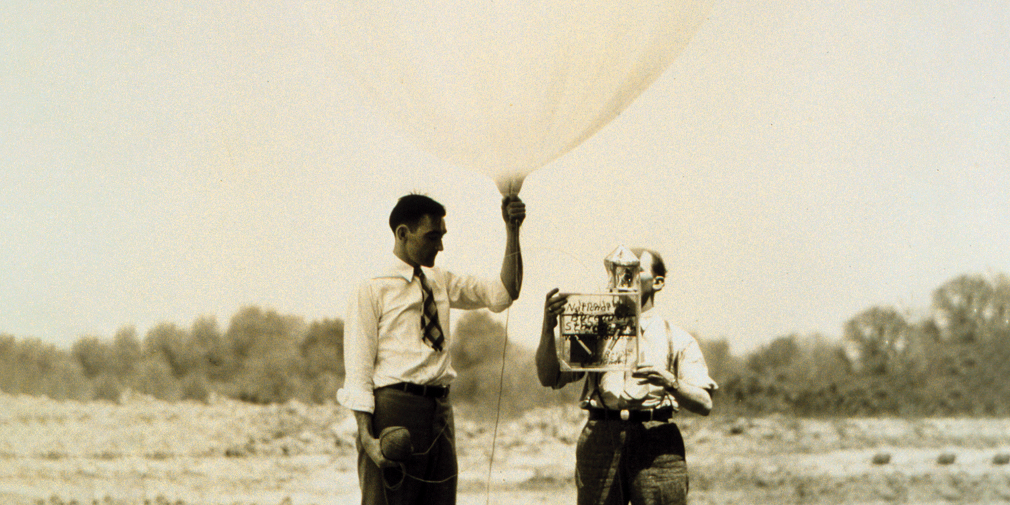 Weather researchers releasing a radiosonde on a balloon (c 1947)