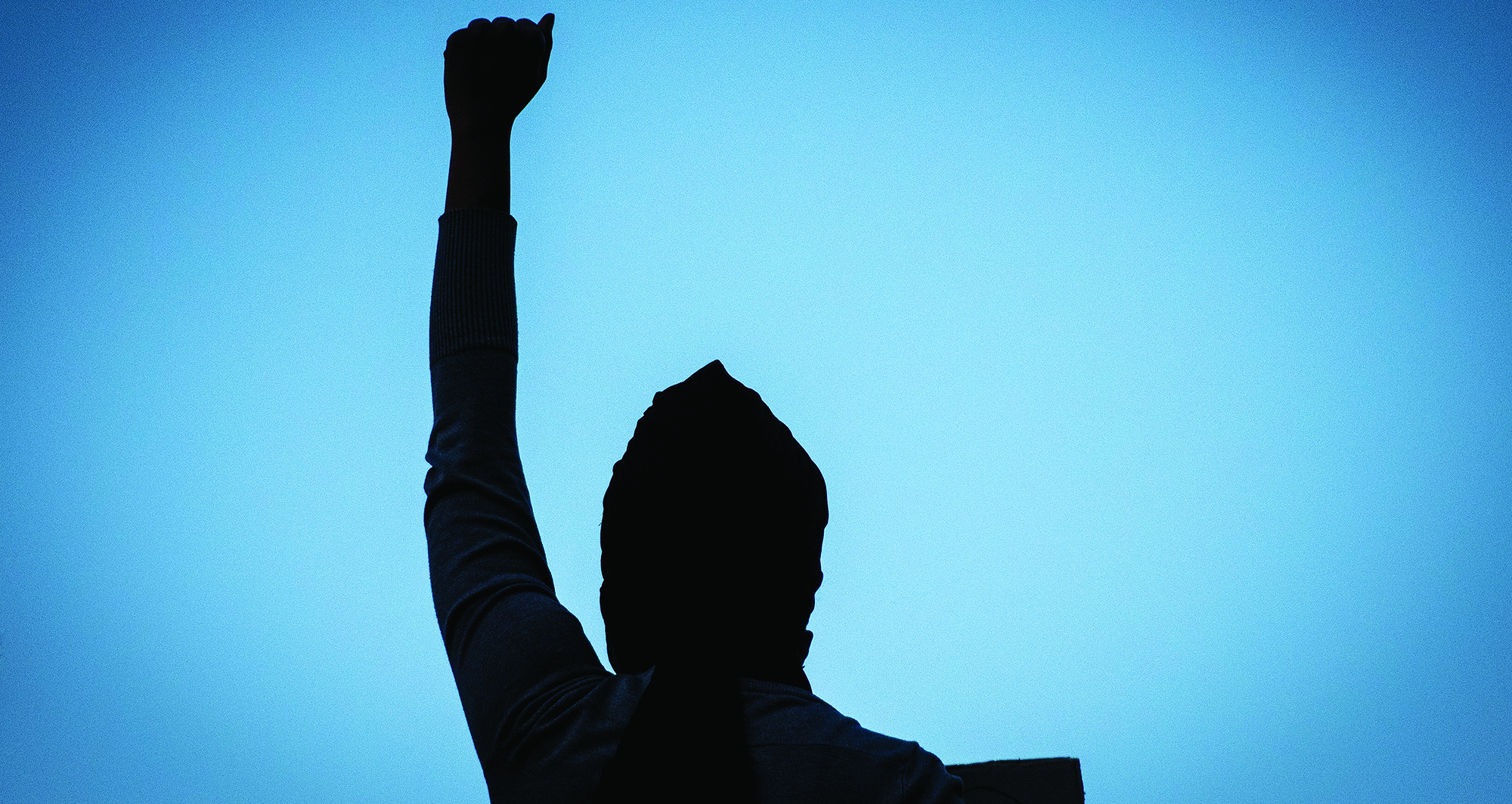 Protester with arm raised