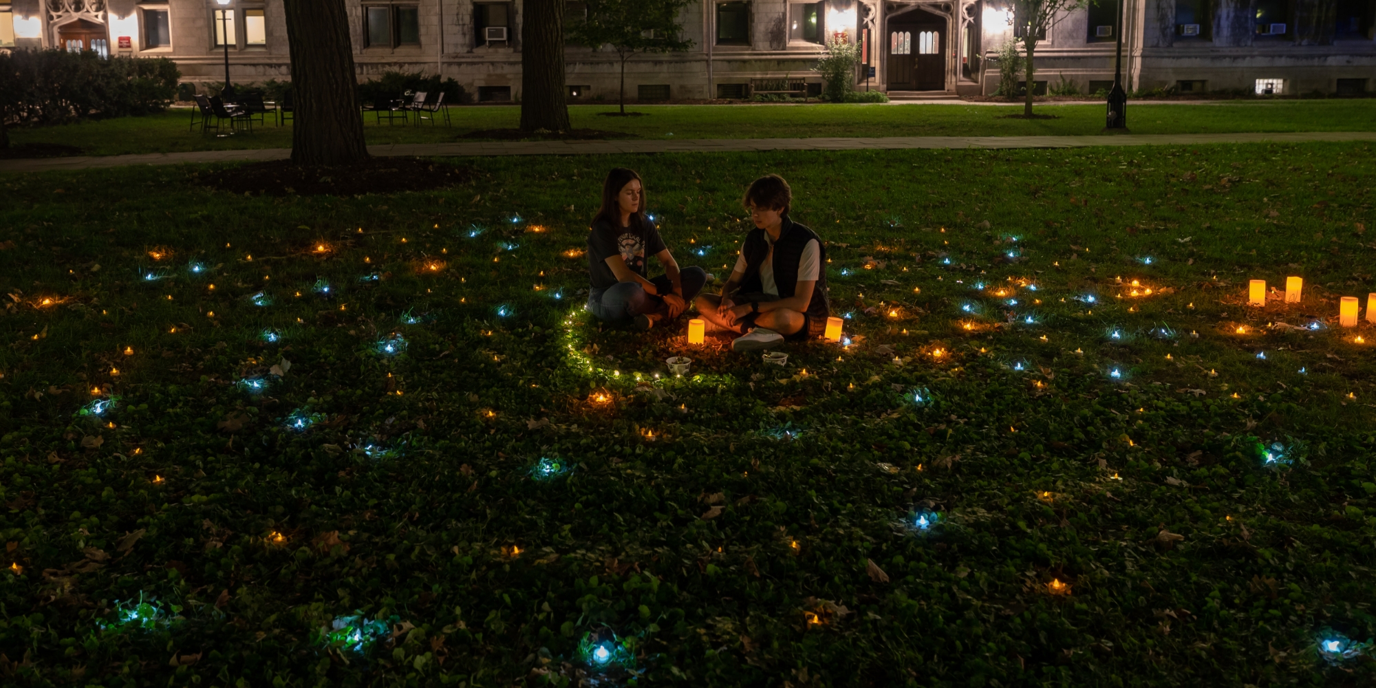 Students participating in Late-Night Labyrinth on the quads at UChicago