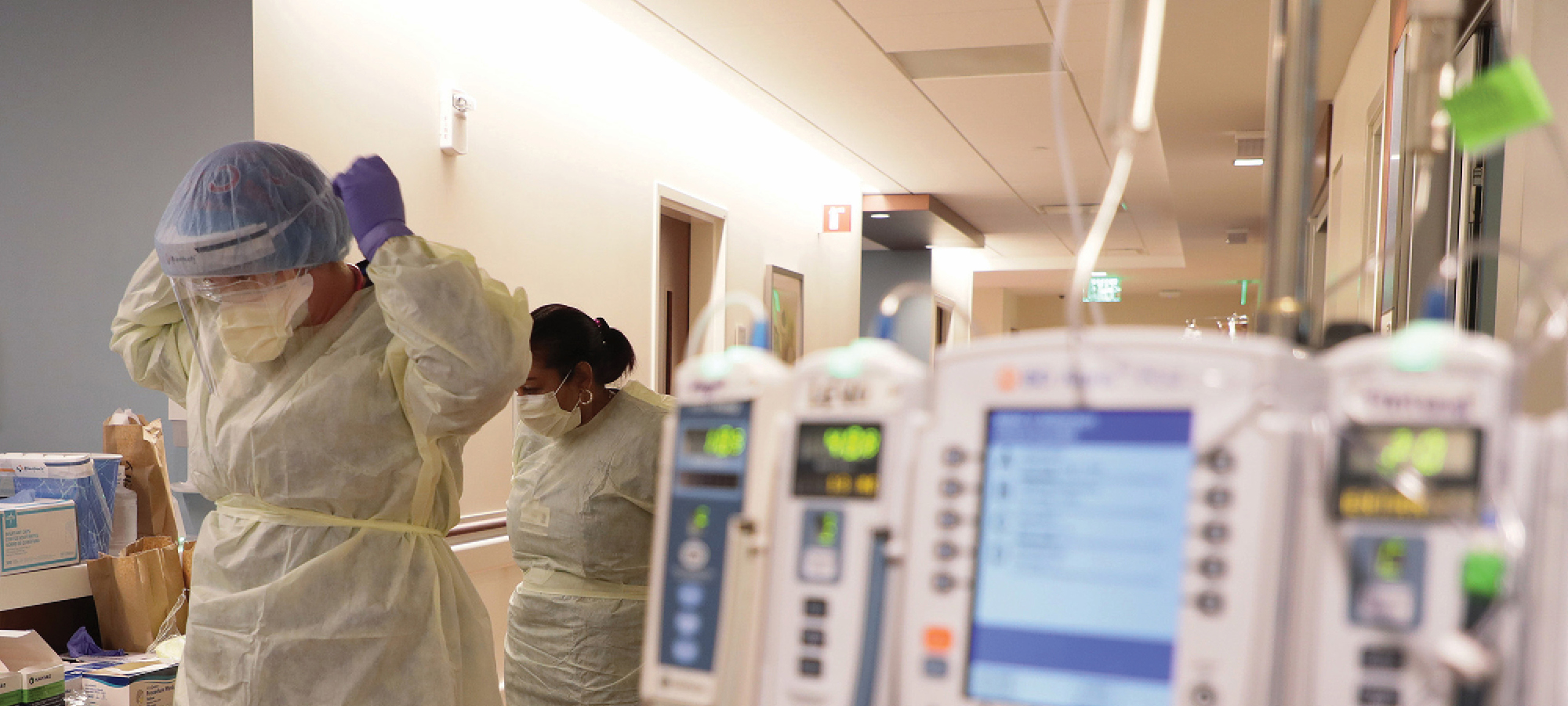 nurses wearing PPE in a hospital