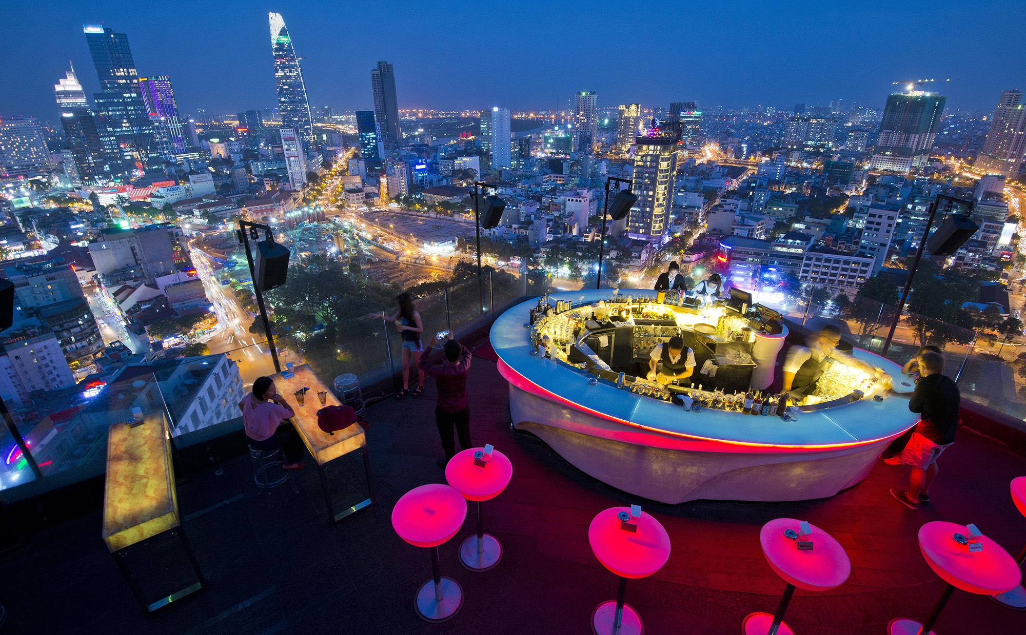 Ho Chi Minh City night skyline from a rooftop bar