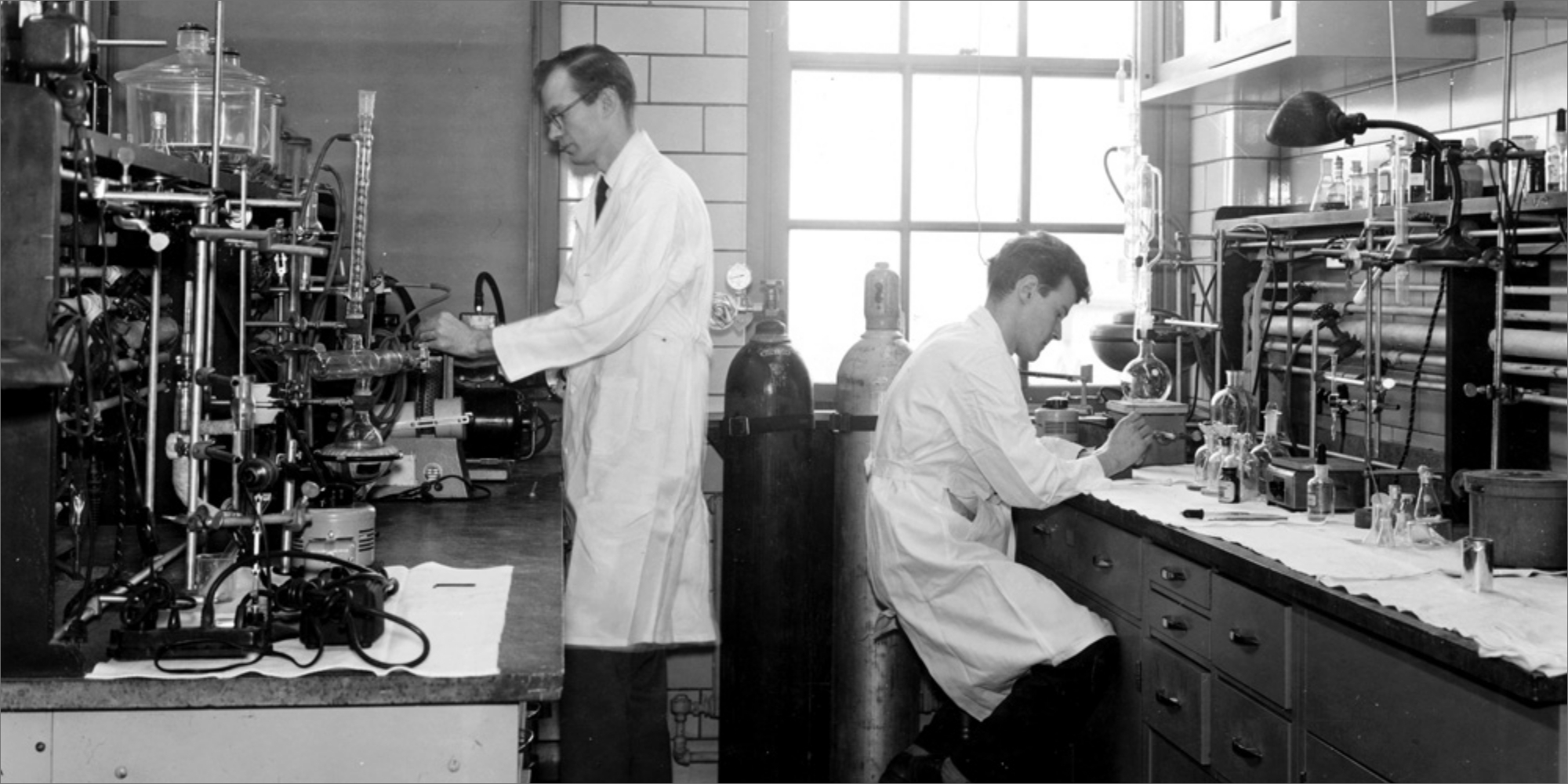 Archival photo of two scientist in a University of Chicago Lab