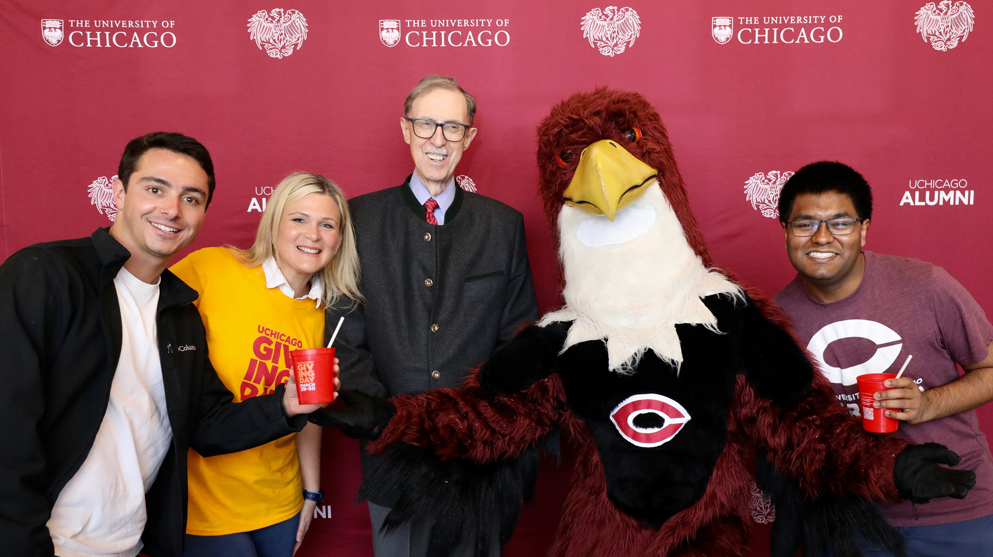Dean John Boyer and Phil the Phoenix with friends on Giving Day 2023