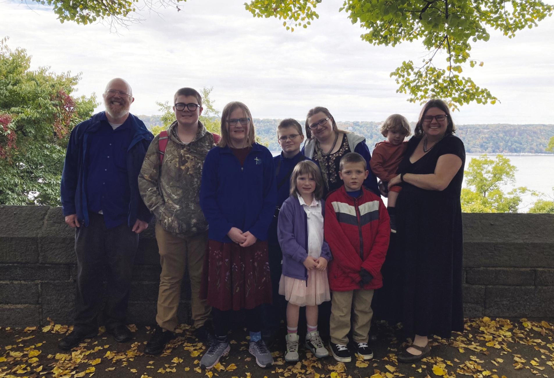 John Mundy, AB’01, and Deirdre Mundy, AB’99, on a college tour with seven of their eight children (left to right): Ben, Ada, Max, Ella, Cecilia, Henry, and Charles. 