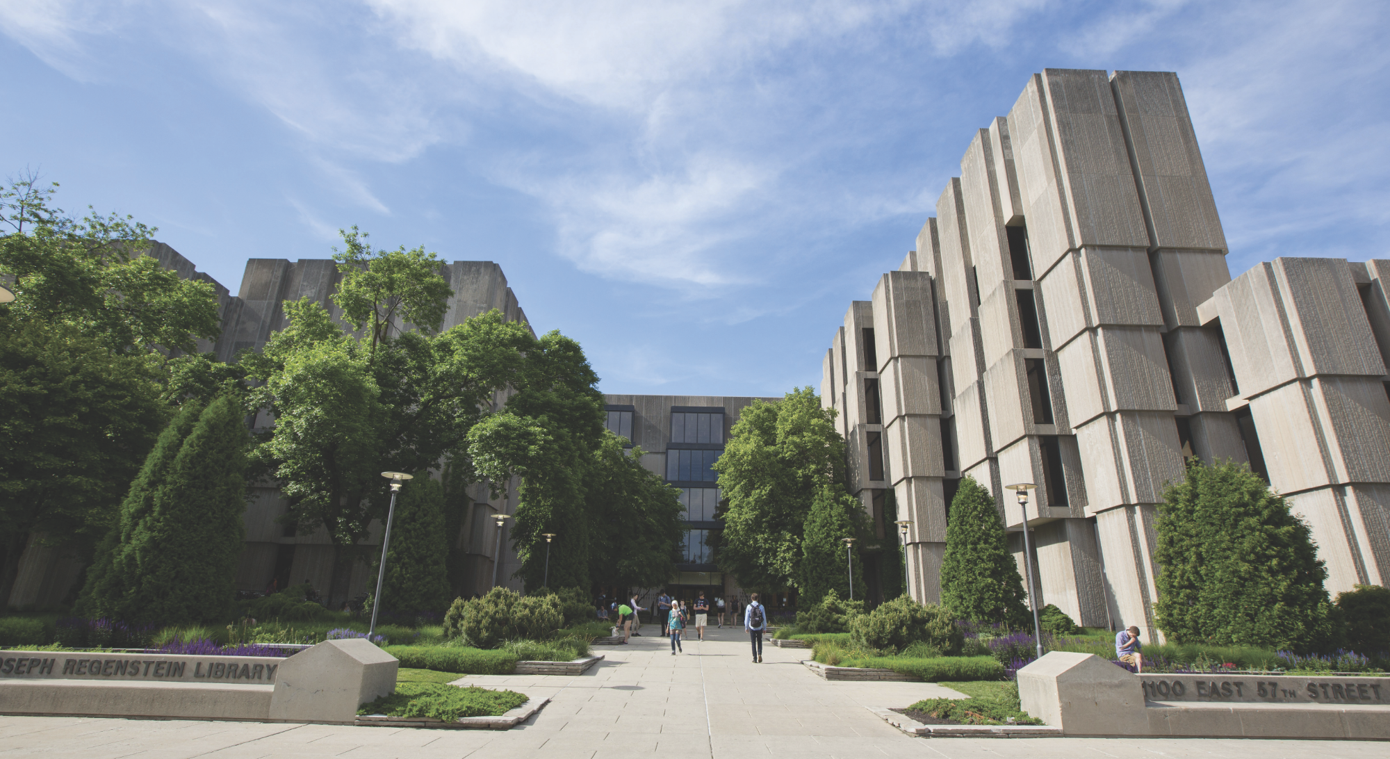 An exterior photograph of UChicago's brutalist Joseph Regenstein Library on a sunny day.