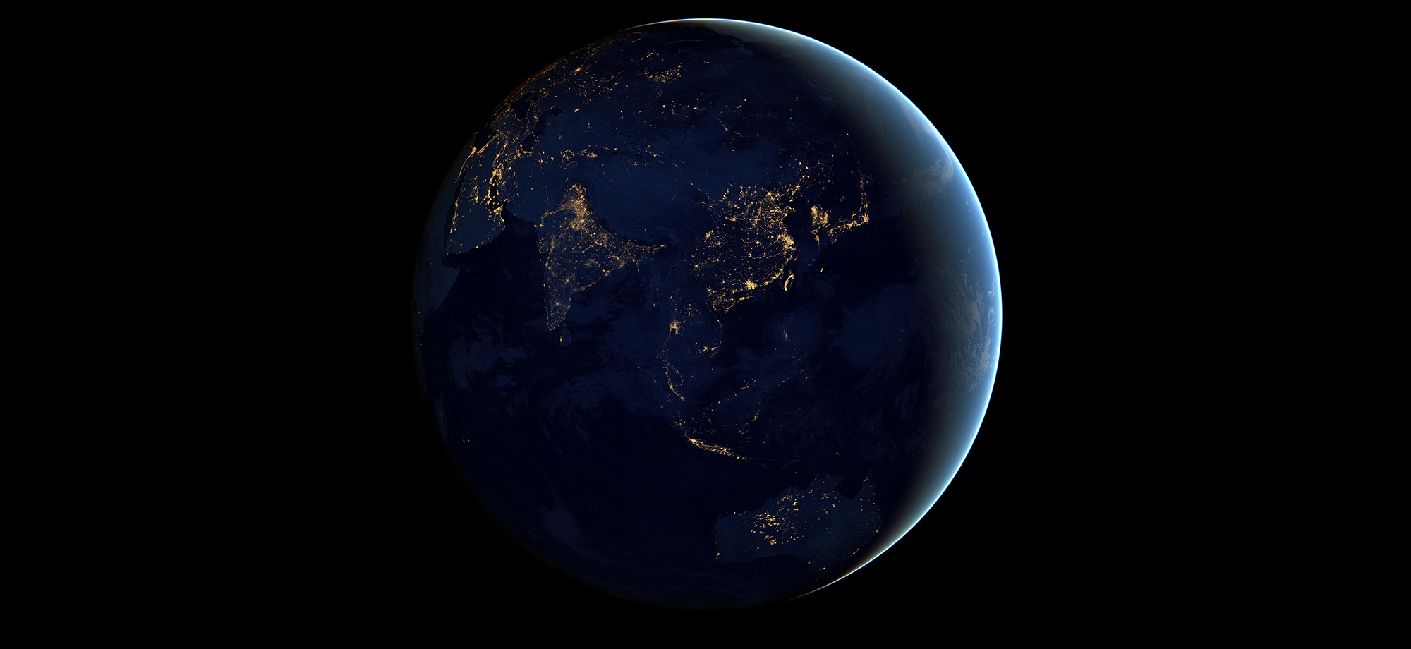 NASA black marble photo showing Asia and Australia at night