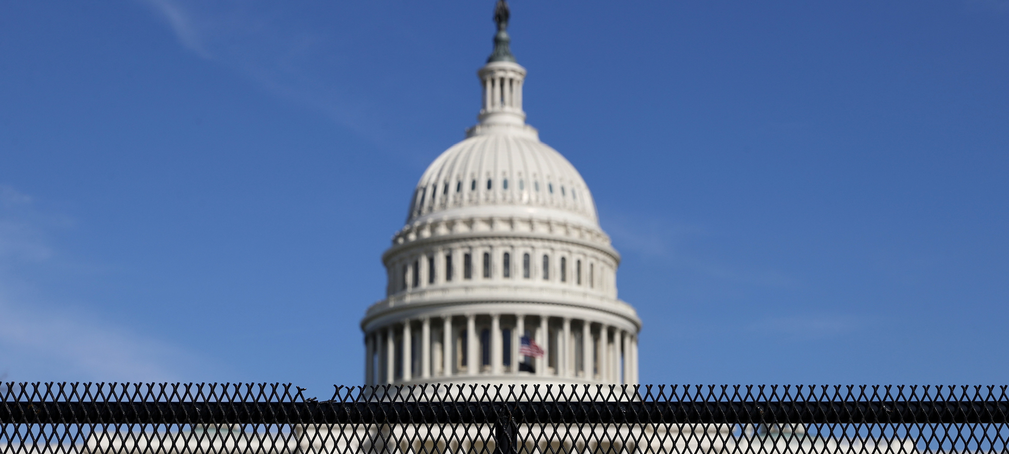 US Capitol behind fencing after the January 6 insurrection