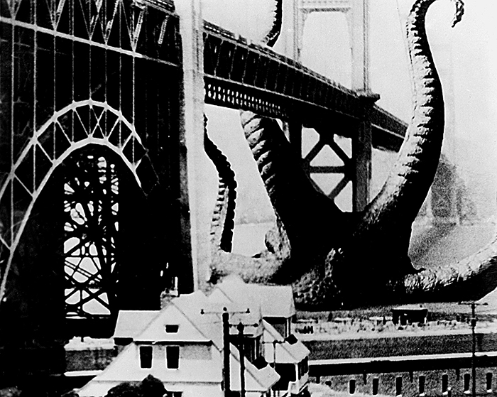 A giant octopus wrapping itself around the Golden Gate Bridge in the film It Came from Beneath the Sea