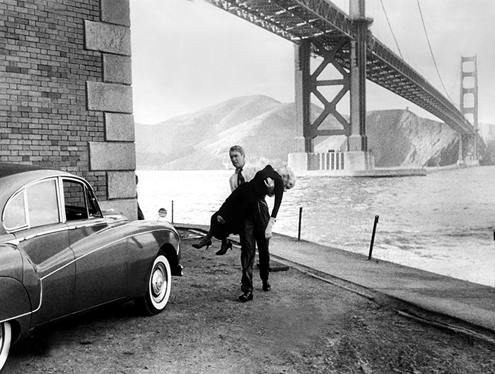 James Stewart carrying Kim Novak after her dip in the SF Bay in the film Vertigo