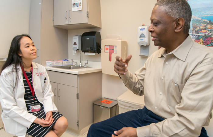 Joyce Tang with a patient