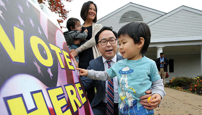 US Rep. Andy Kim, AB’04, with his wife and two sons