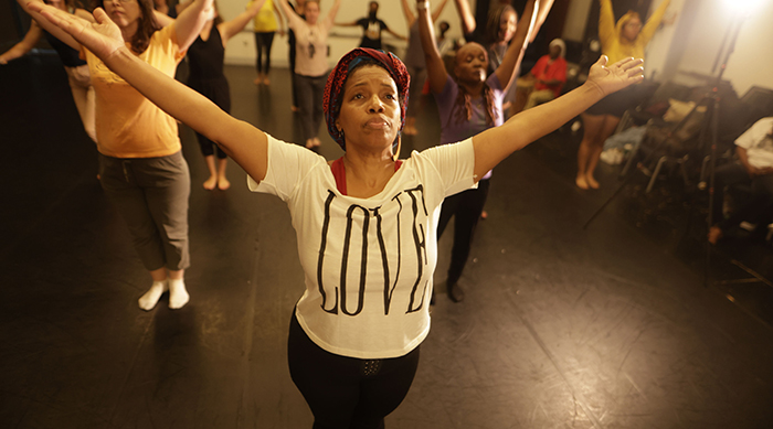 Dancers warm up. 