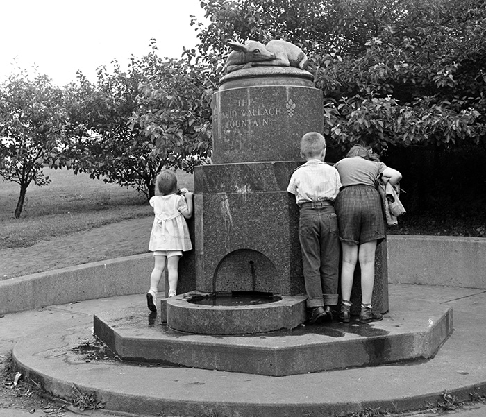 Children drinking from the David Wallach Memorial Fountain in 1955