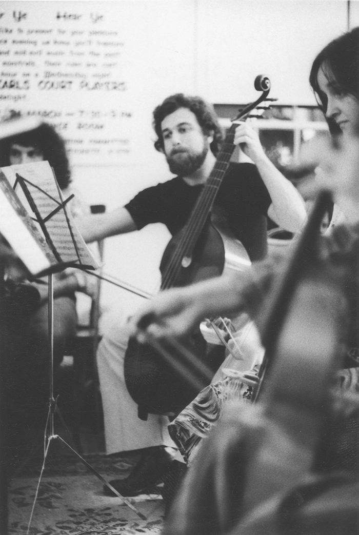 James H. Moore playing the cello in the early 1970s