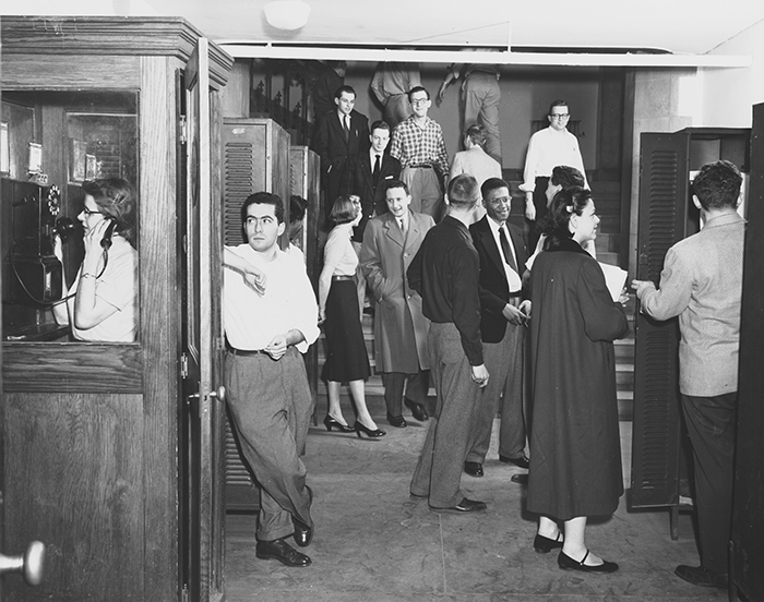 Students gather around the lockers in Stuart Hall when it housed the Law School 