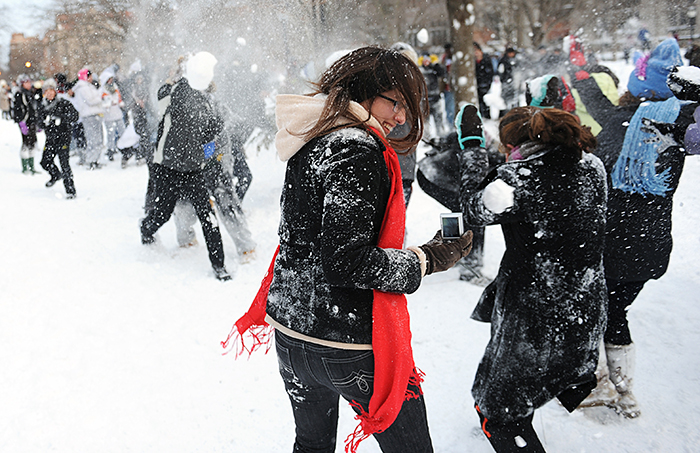 students having a snowball fight on the quads in 2011 