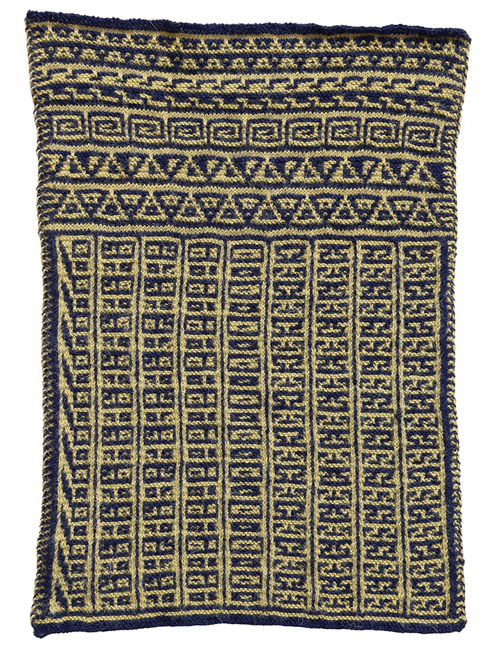 Knitted panel with yellow and navy geometric designs