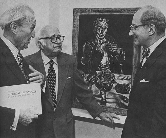 Three men in suits stand in front of a self portrait by Ivan Albright