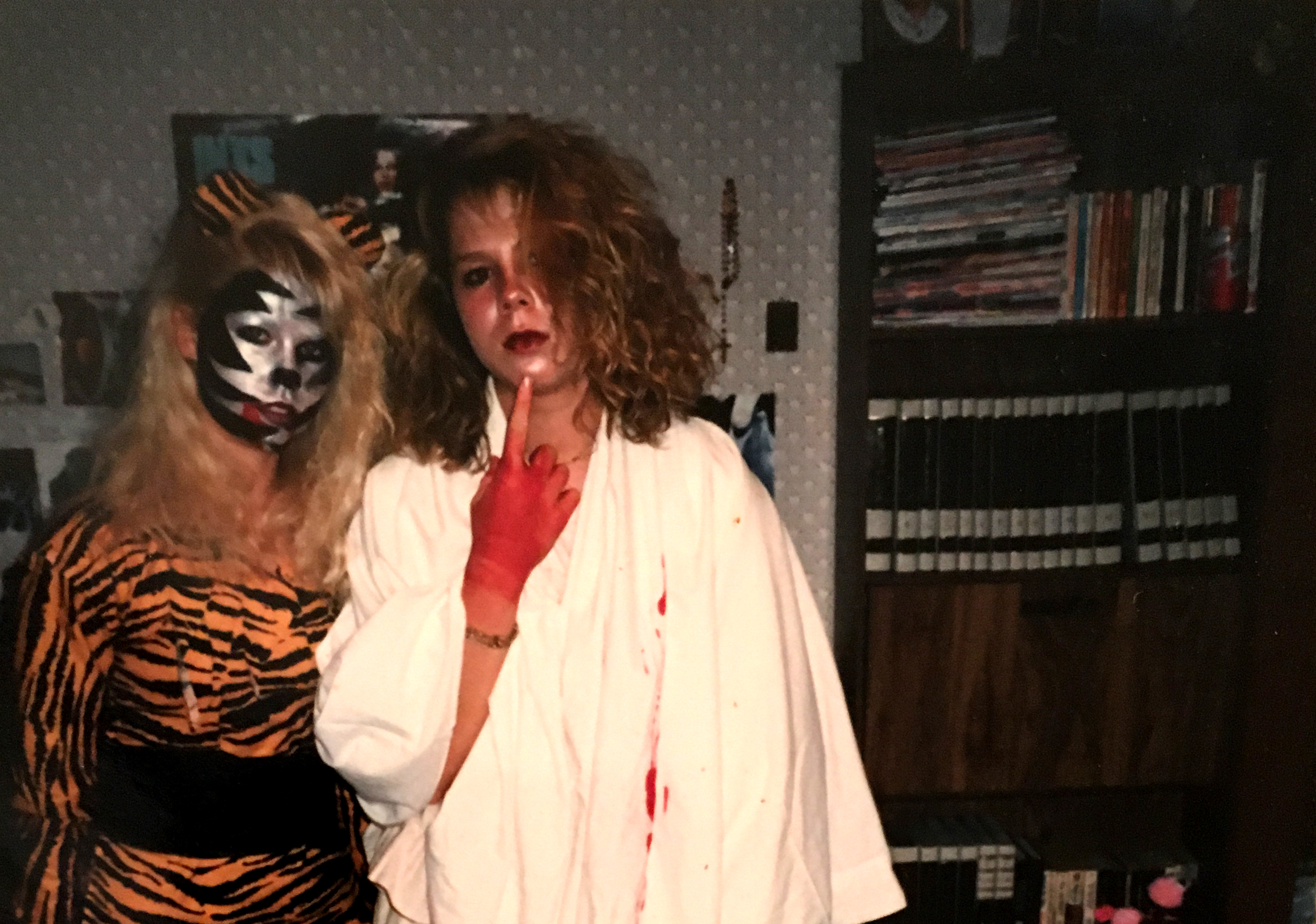 Mattie and cousin Elena in Halloween costumes during high school.