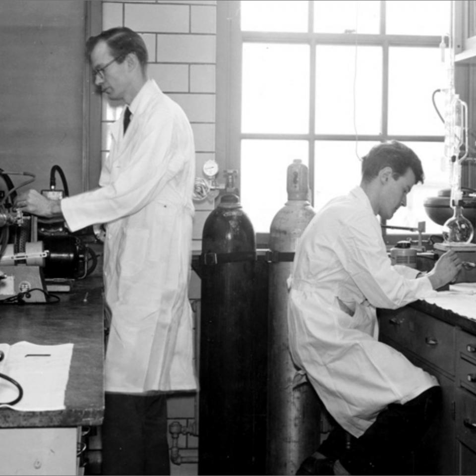 Archival photo of two scientist in a University of Chicago Lab