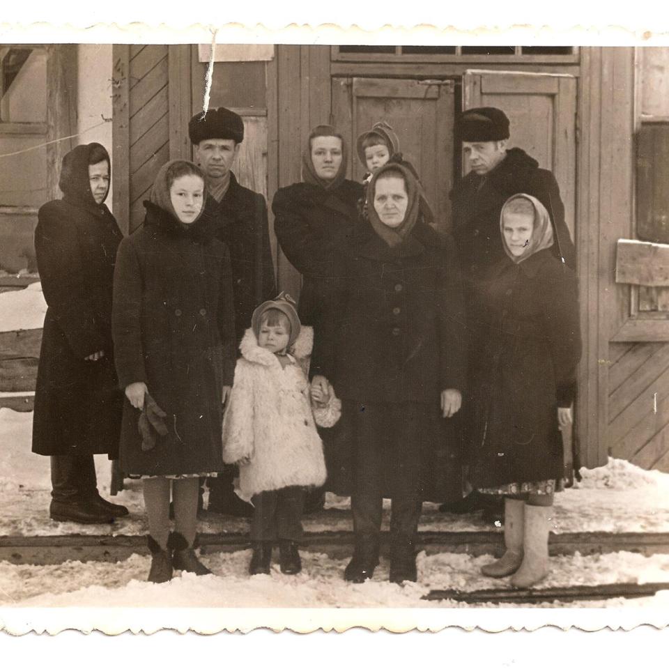 A mid-20th century family during a Siberaan winter (6 adults, 1 young girl, 2 small children)
