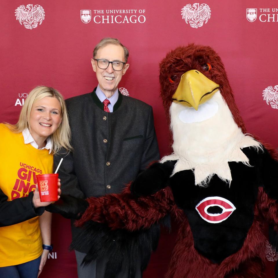 Dean John Boyer and Phil the Phoenix with friends on Giving Day 2023
