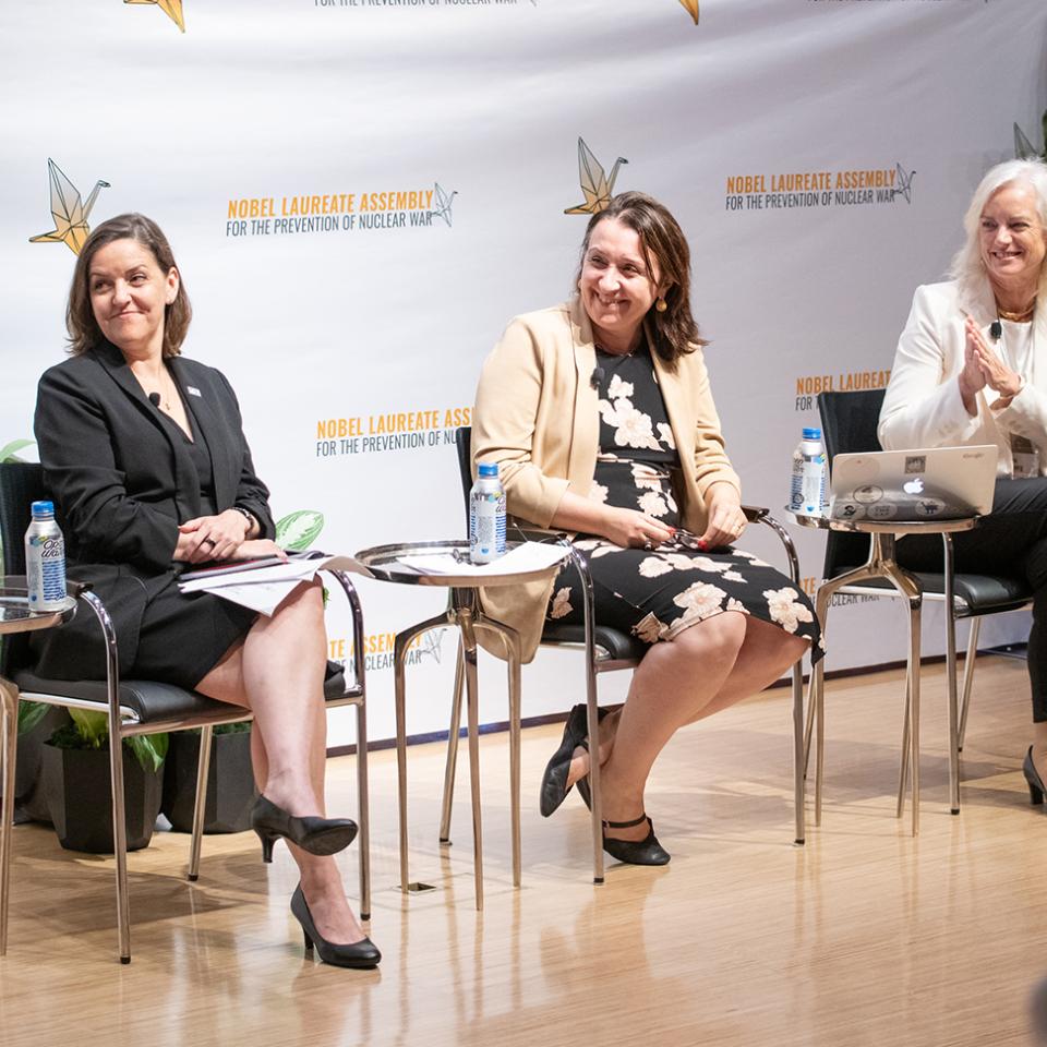 David Gross, Alexandra Bell, Francesca Giovannini, Karen Hallberg, and Brian Schmidt at the Nobel Laureate Assembly for the Prevention of Nuclear War.
